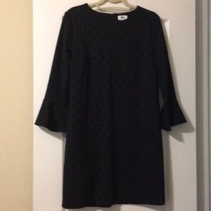 Black swing dress with bell sleeve